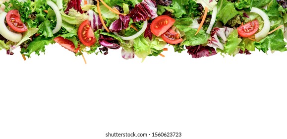 Fresh salad leaves mix border or background isolated on white