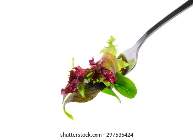 Fresh Salad On Fork On White Background