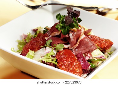 Fresh salad of smoked duck breast, lettuce and chutney - Powered by Shutterstock