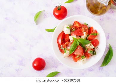 Fresh Salad With Tomato, Mozzarella And Basil. Top View.