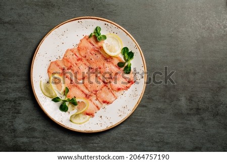 Fresh salmon carpaccio . Restaurant menu. 