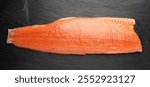 Fresh Salmon Fillet, Raw Norwegian Red Fish, Trout Meat Piece, Big Fresh Atlantic Salmon Fillet on Black Stone Background Top View