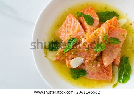 fresh salmon raw with spicy seafood salad sauce