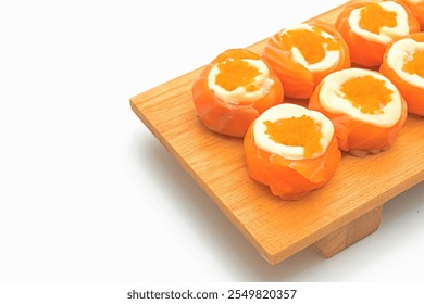 fresh salmon sushi roll with mayonnaise and shrimp egg isolated on white background - Powered by Shutterstock