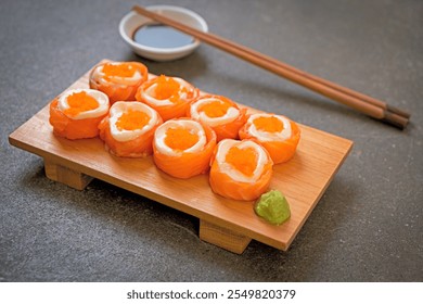 fresh salmon sushi roll with mayonnaise and shrimp egg - Japanese food style - Powered by Shutterstock