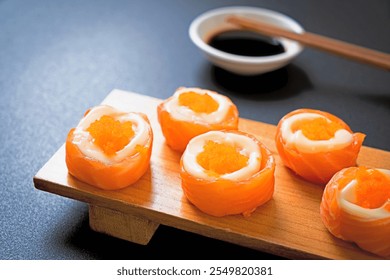 fresh salmon sushi roll with mayonnaise and shrimp egg - Japanese food style - Powered by Shutterstock