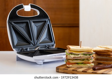 Fresh sandwich with cheese, herbs, tomato, cucumber and bacon on the wooden desk with bread. - Powered by Shutterstock