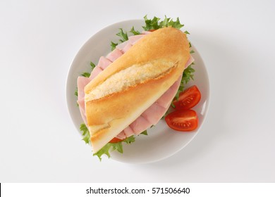 Fresh Sandwich With Ham On White Plate