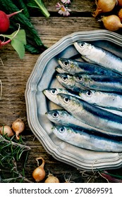 Fresh Sardines. Fish With Vegetables. Mediterranean Fish On Plate