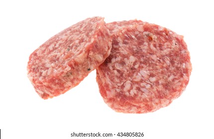 Fresh Sausage Patties Isolated On A White Background.