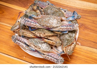 Fresh Seafood  Blue Crab On Wooden Background  Ready To Cook.  