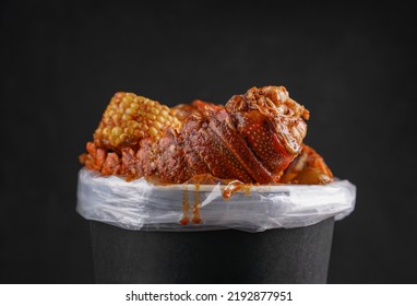 Fresh Seafood In The Bucket On The Black Natural Background.   