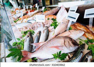 Fresh seafood on ice at the fish market - Powered by Shutterstock