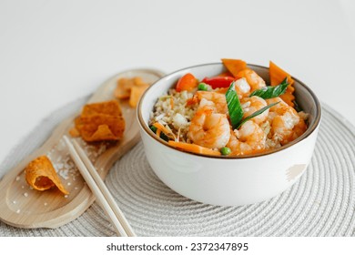 Fresh seafood recipe. Shrimp poke bowl with fresh prawn, brown rice, pickled sweet onion, radish, soy beans edamame portioned with black and white sesame. Food concept poke bowl - Powered by Shutterstock