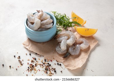 Fresh shrimp tails isolated. Raw headless prawn, pacific shrimp, uncooked prawns, seafood on white background