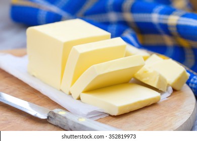 Fresh sliced butter on the wooden table