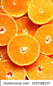 Fresh Sliced Orange Fruit Texture. Macro, Top View, Copy Space. Food Frame. Juicy Oranges Background.