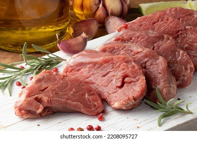 Fresh Sliced Tenderloin On Wooden Board