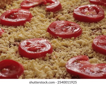 Fresh slices of tomato and cheese arranged on a rustic baking tray for pizza. Slices of ripe tomatoes and cheese are neatly placed on a wooden surface for pizza preparation. - Powered by Shutterstock