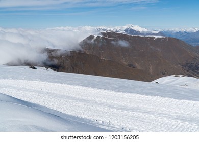 Fresh Snow Mobile Tracks In The Snow At Cardrona, New Zealand