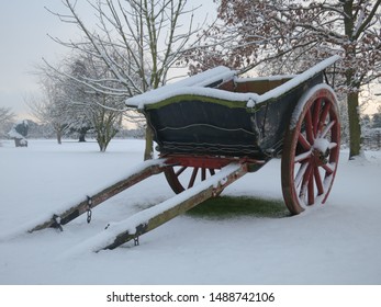 Fresh Snow On A Neglected Horse Drawn Carriage/cart