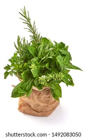 Fresh spices and herbs bouquet, isolated on white background. Thyme, basil, rosemary.