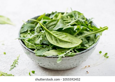 Fresh Spinach Leaves With Arugula In A Bowl Close Up