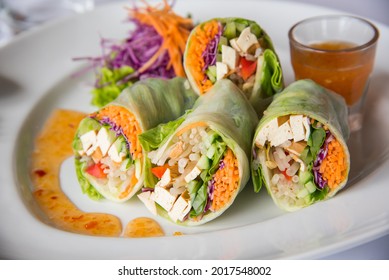 Fresh Spring Rolls, Served On A White Plate