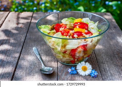 Fresh Spring Salat In The Garden On The Table