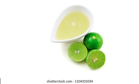 Fresh squeezed lime juice white background 