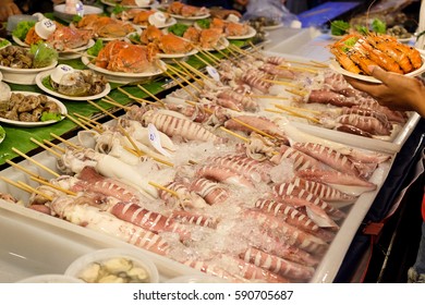 Fresh Squid And Mix Of Seafood In Seafood Festival