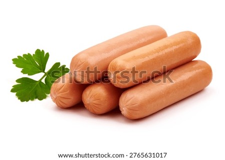 A fresh stack of five light brown hot dog sausages, glossy and plump, sits beside a vibrant green sprig of parsley, suggesting a simple, ready to cook meal, isolated on white background