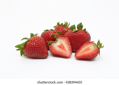 Fresh stawberries cut off on white background - Shutterstock ID 438394435