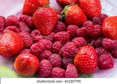 Fresh Strawberries And Raspberries