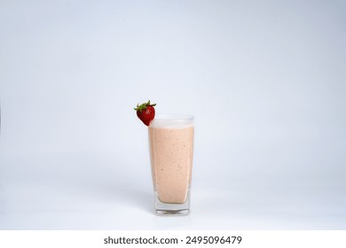 Fresh strawberry smoothie in a glass with a fresh strawberry garnish. Healthy and refreshing drink, perfect for breakfast or a snack. - Powered by Shutterstock