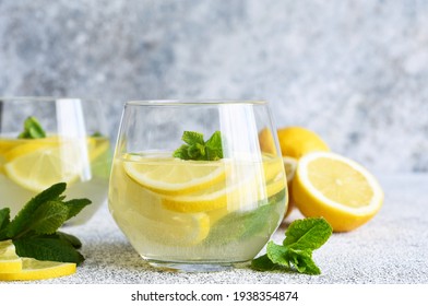 Fresh summer drink. Cold lemonade with mint on a concrete background. - Powered by Shutterstock