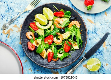 Fresh summer salad with prawn,strawberry,avocado,lime and olive.Summer salad,healthy eating - Shutterstock ID 1973821043