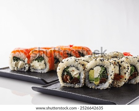 Similar – Image, Stock Photo Delicious sushi rolls on board with chopsticks