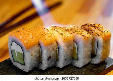 Fresh Flambé Sushi With Salmon Topping