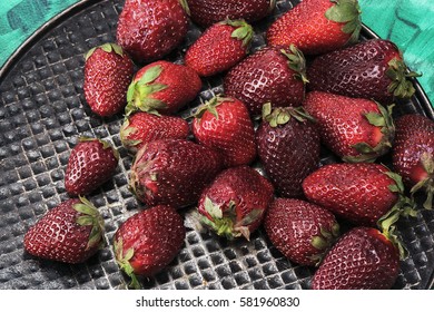 Fresh, sweet, delicious strawberries closeup. The view from the top