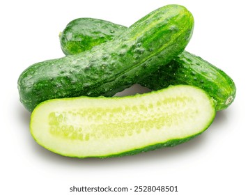 Fresh sweet small cucumbers and cucumber longitudinal section isolated on white background. Cucumbers that are used to pickling or slicing.