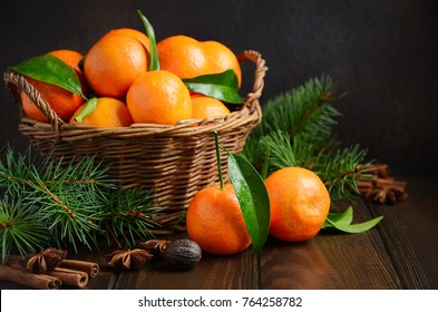 Fresh Tangerine Clementines With Spices On Dark Wooden Background, Christmas Concept.