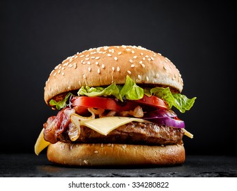 fresh tasty burger on black background - Powered by Shutterstock