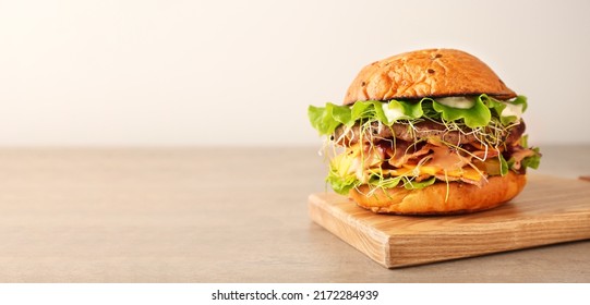 Fresh Tasty Burger On Table. Banner For Design