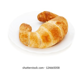 Fresh And Tasty Croissant On Plate Isolated On White Background