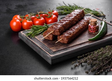 Fresh tasty kebab grilled with spices and herbs. Grilled meat dish