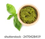 Fresh tasty pesto sauce and basil isolated on white, top view