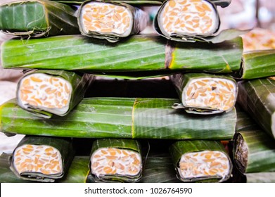 Fresh tempeh stacked and sold in a local market in Indonesia - Shutterstock ID 1026764590