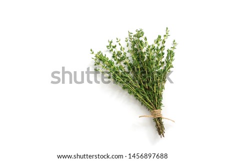 Fresh thyme herb on white background. Bouquet of thyme isolated. View from above