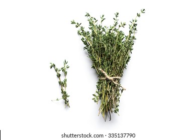 Fresh thyme isolated on white - Shutterstock ID 335137790